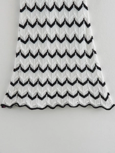 Vertical view of a summer sleeveless striped knit mini dress with zigzag mesh patterns