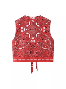 Women's red paisley print sleeveless vest jacket with lace-up back detail in street style