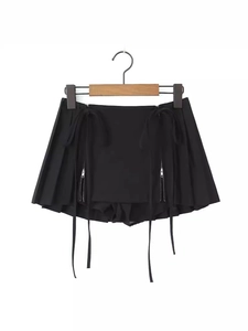 High-waist black pleated mini skirt with double metal zippers and long decorative streamers