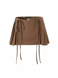 High-waisted brown pleated mini skirt with long decorative ribbons and side zipper detail