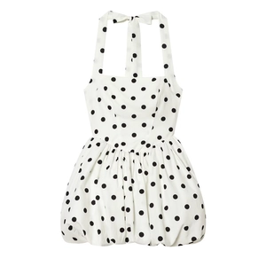Retro white halter neck dress with black polka dots and a stylish puffy skirt