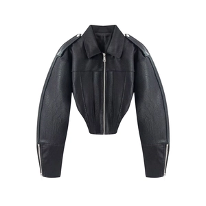 Detail of glossy black faux leather jacket with exaggerated arc sleeves and slim waist