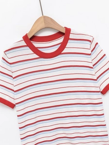 Detail of red, blue, and white striped knit t-shirt with ribbed crew neck and soft texture