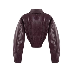 Detailed back view of a burgundy cropped faux leather jacket with puffed bubble sleeves