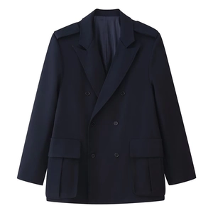 Detail view of navy blue double-breasted blazer with epaulettes and large flap pockets