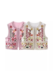Y2K crop vest with heavy floral embroidery in pink and white styles on white background