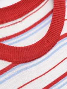 Detail of red ribbed neckline and rainbow stripes on fine knit cotton fabric t-shirt
