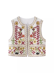 White sleeveless Y2K waistcoat featuring vibrant ethnic floral embroidery on front
