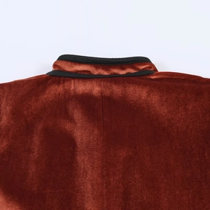 Deep rust red velvet blazer with black ribbed collar trim for street fashion styles