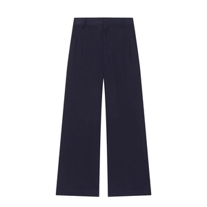 Detail of navy pinstripe wide-leg suit trousers with high-waist and smooth drape texture