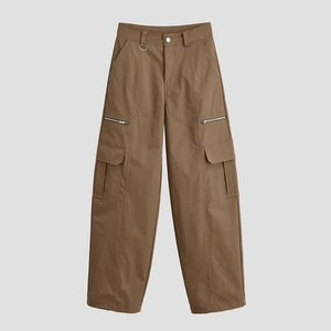 Brown utility cargo pants with large flap pockets and metal zipper details on gray background