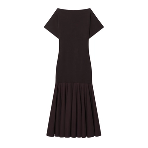 Detail of dark chocolate knit dress featuring elegant batwing sleeves and fishtail pleats