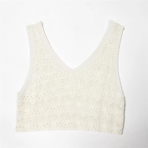 White crochet knit V-neck sleeveless dress with geometric hollow patterns in a slim fit