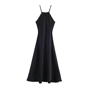 Detailed view of the black satin halter dress showing glossy fabric and elegant drape