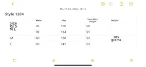 Detailed size chart for polka dot asymmetric skirt with waist and hip measurements