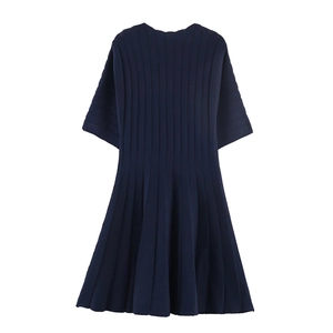 Short sleeve navy blue ribbed knit dress with pleated A-line skirt in minimalist style