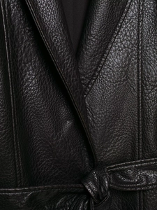 Close-up of black leather coat featuring premium stitching, lapels and a belted waist tie