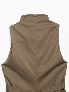 Detail of high collar and hidden zipper on khaki twill vest for women back view
