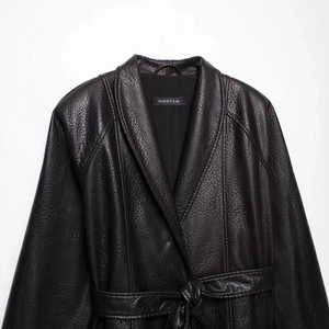 Chic black belted leather-effect coat with large lapels and high-quality grain texture