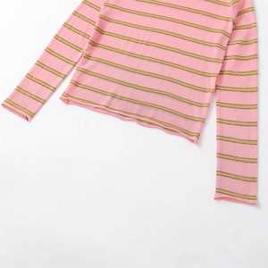 Minimalist pink long sleeve knit sweater with green stripes and subtle rolled edges