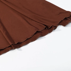 Brown off-shoulder dress with elegant wavy hemline and high-stretch knit fabric detail