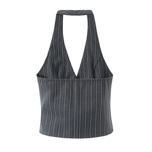 Detail of pinstripe halter neck crop top vest with deep V-neckline and button closure