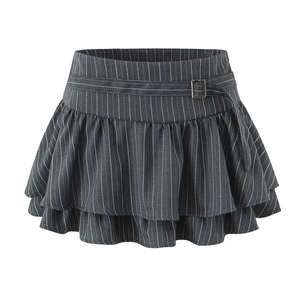 Detail of dark grey striped pleated mini skirt with layered ruffles and metal buckle belt
