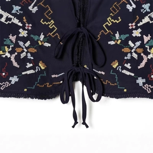 Navy blue floral embroidered top with tie-up closure and frayed hem details
