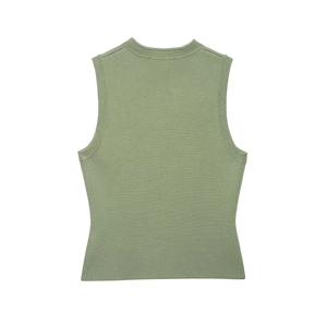 Detail of green knitted vest back showing fine texture and slim sleeveless design
