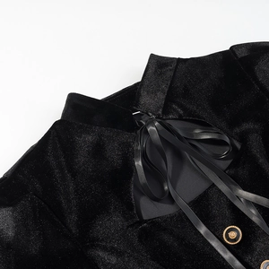 Elegante abito in velluto nero con collo alto, apertura posteriore e fiocco di seta