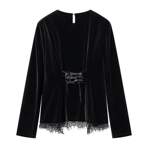 Elegant black velvet long sleeve top with lace trim and cross strap back detail