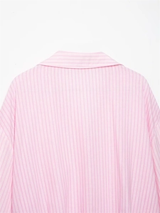 Close-up of the striped collar and back detail on a pink and white vertical shirt