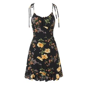 Black floral sundress with yellow poppy print and ruffled hem for summer wear