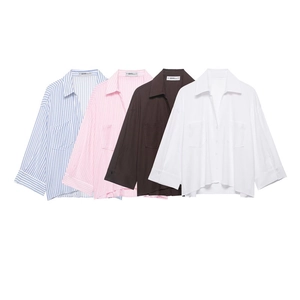Oversized women's solid and striped shirts with dual chest pockets in four versatile colors