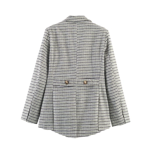 Back view of a French vintage asymmetrical green plaid blazer with decorative buttons