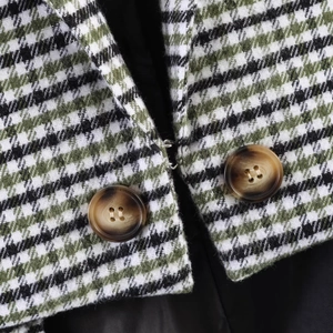French style asymmetrical plaid blazer in green and black with tortoiseshell buttons