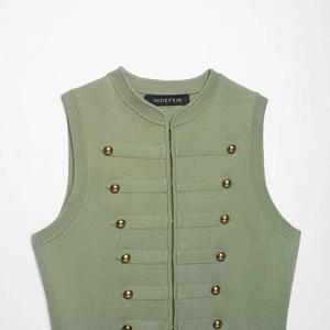 Sage green knitted vest featuring military-style double-breasted gold ball buttons