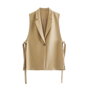 Detail of khaki sleeveless vest blazer with notch lapel and side metal D-ring buckle