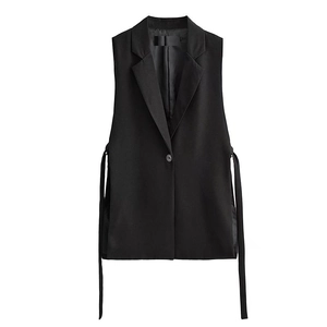 Detail of black sleeveless blazer vest featuring side drawstring ties and single button