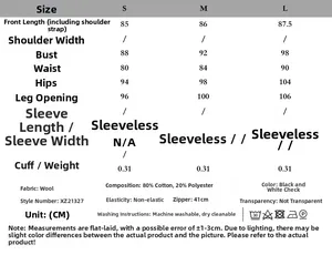 Size chart for black and white houndstooth wool mini dress showing S to L measurements