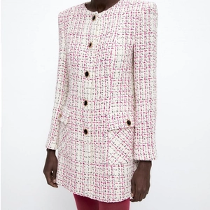 Pink and white tweed long sleeve jacket with golden buttons and textured boucle fabric