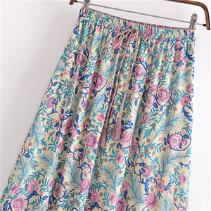 Bohemian floral maxi skirt with elastic high waist and tassel drawstring detail