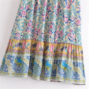 Bohemian floral cotton maxi skirt with peacock print and tassel hem details