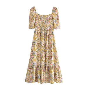 French vintage floral midi dress with square neck and puffed sleeves in yellow print