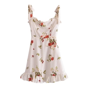 French vintage floral midi dress with spaghetti straps and ruffles on white background