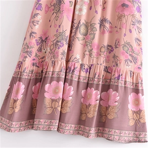 Floral print cotton maxi skirt with tiered ruffle hem and bohemian tassel drawstring