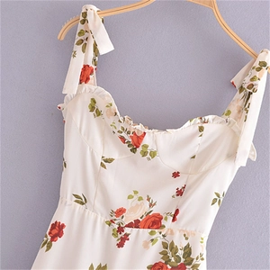 French vintage floral midi dress with red roses, white ruffles and bow straps