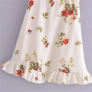 French vintage floral midi dress with red roses and elegant ruffled hem detailing