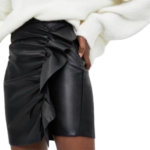 Slim fit black faux leather mini skirt with ruffle trim detail and high waist design