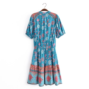 Bohemian floral print midi dress in bright blue with V-neckline and elastic waist design